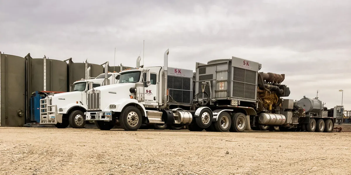 S&K pump and testing trucks lined up on location